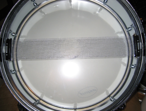 Snares on a drum